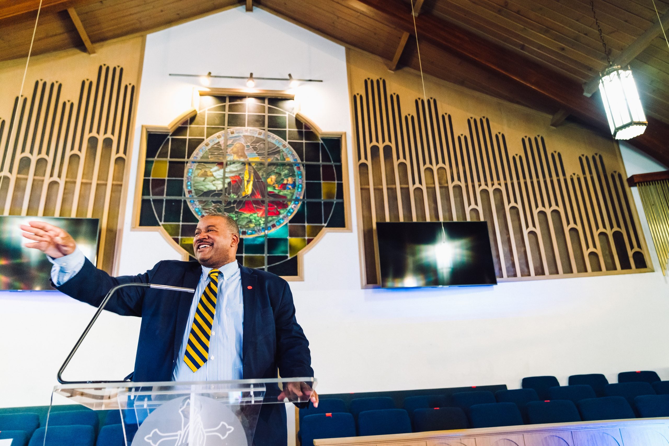 Reverend Rodrick K. Burton, the pastor of New Northside Missionary Baptist Church, addressing his congregation